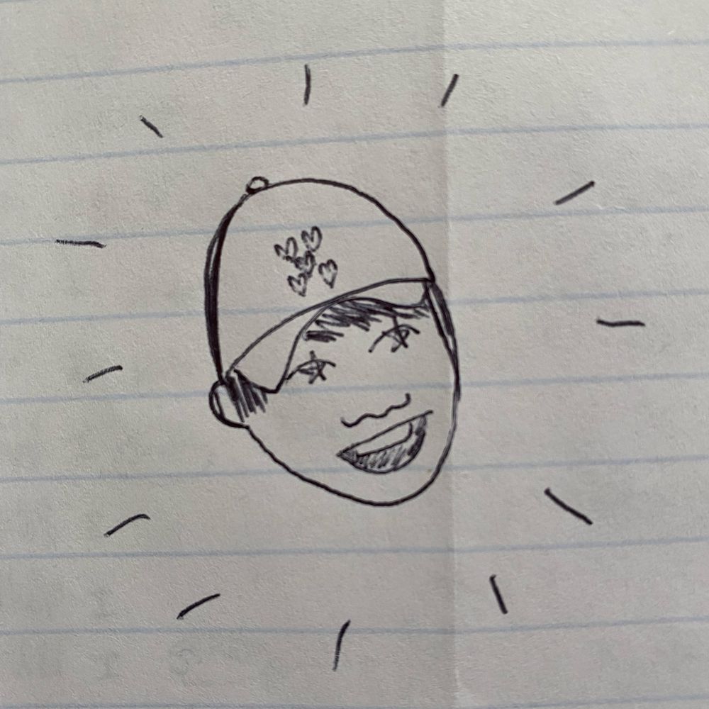 Sketch of Yoongi’s face looking starry-eyed with a ball cap on